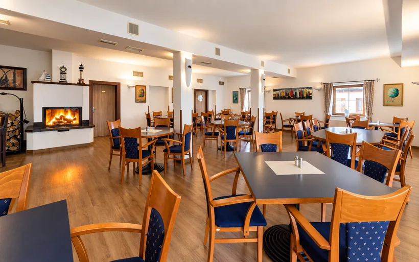 Pěkné posezení s krbem v útulné restauraci!